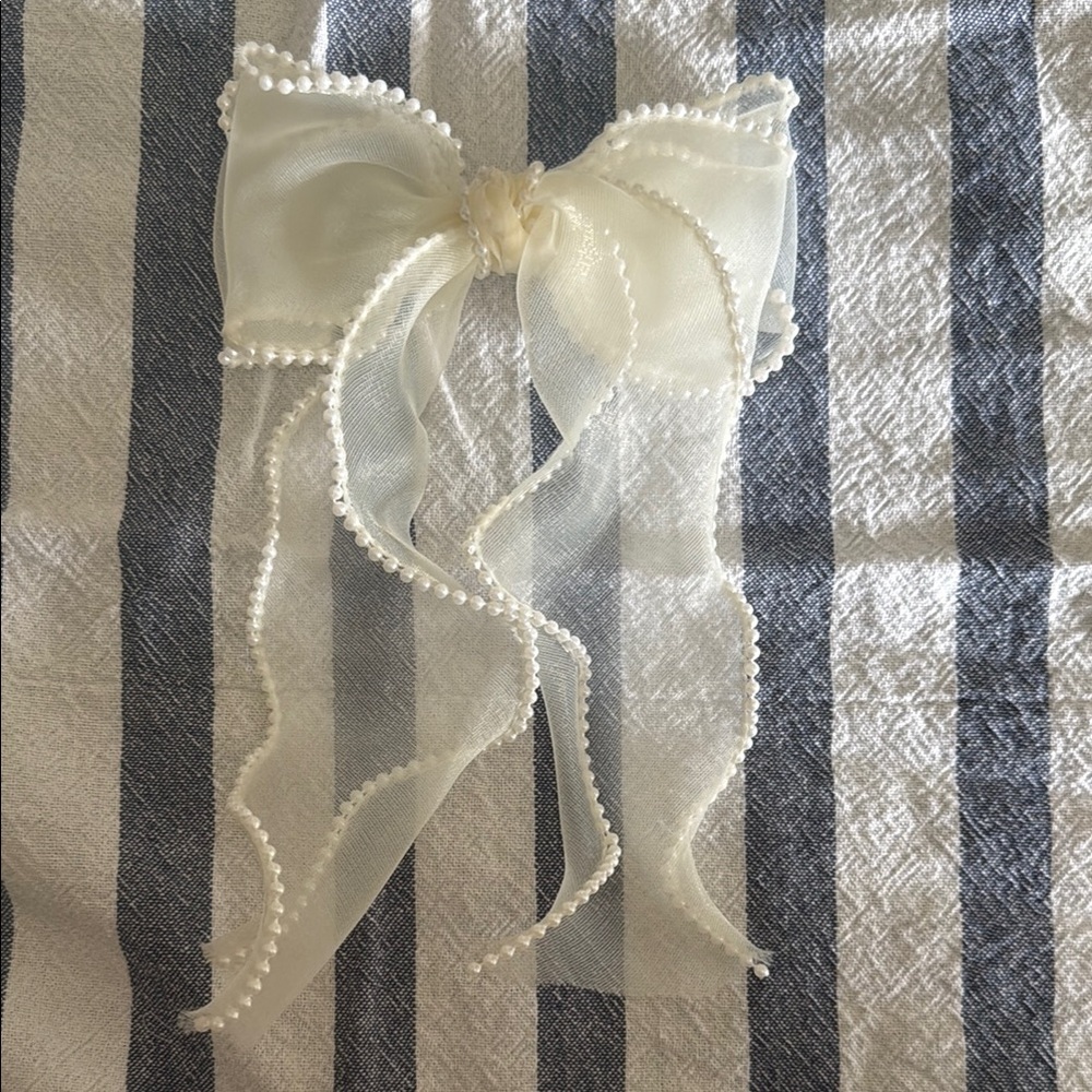 Elegant Sheer Bow with Pearl Trim